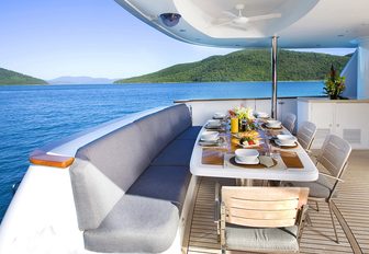 breakfast is served in the alfresco dining area aboard luxury yacht ‘De Lisle III’ 