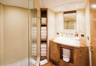 one of the his and her bathrooms on board motor yacht Benita Blue 