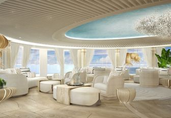 Overview of the skylounge onboard superyacht KISMET, with abundant plush white seating and large full-length windows