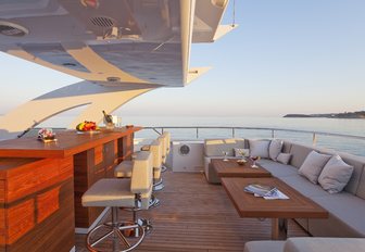 bar and seating area on the sundeck of luxury yacht JEMS