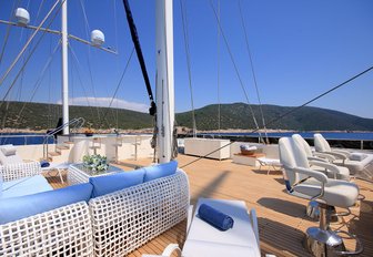 seating areas, bar and sun loungers on the sundeck of charter yacht MEIRA 