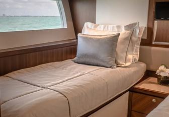 Single bed in cabin on motor yacht ENTREPRENEUR