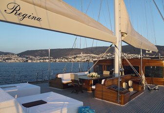 al fresco dining area and sun pads on the foredeck of sailing yacht Aria I 