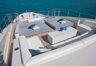 bow area on luxury yacht ‘H with a spa pool, seating and sun pads