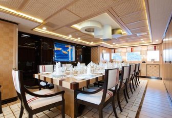 The formal dining space on board superyacht AXIOMA