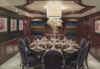 The formal dining area onboard superyacht Carpe Diem II