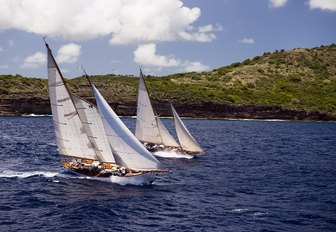 Two classic sailing yachts racing at the Antigua Classic Sailing Regatta