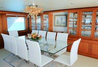 formal dining in the main salon aboard charter yacht BERILDA 
