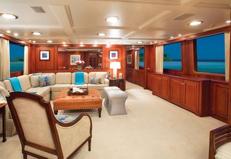 Cream colored furnishings and fixtures in the interior of superyacht Lady J