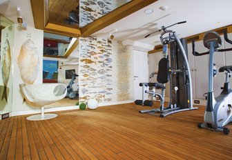 The gymnasium featured on the lower deck of superyacht JOYME
