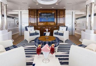 beautiful lounge area on main deck aft of motor yacht ‘Blue Moon’ 