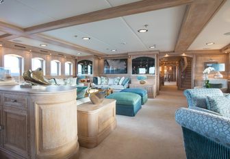 seating areas in limed oak-clad main salon on board motor yacht Nero