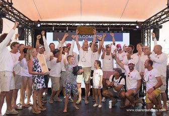 crew of sailing yacht Bolero pick up winning trophy at Superyacht Cup Palma 2017's prize giving ceremony