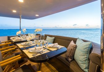 alfresco dining setup aboard charter yacht UNBRIDLED 