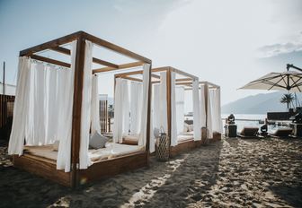 luxury cabanas on the sand at PMYC Beach in Montenegro