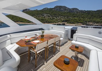 casual dining spot on sundeck of luxury yacht L’EQUINOX