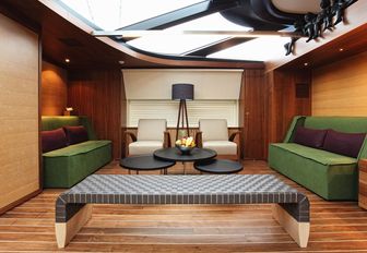 elegant lounge in split-level main salon aboard charter yacht ‘State of Grace’ 