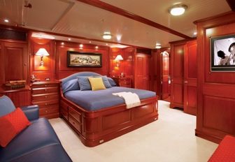 master suite with rich woods and classic styling on board superyacht METEOR 