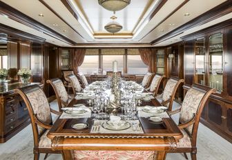 lavish dining room aboard charter yacht TITANIA 