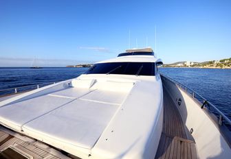 White sunpads on foredeck of luxury charter yacht JURIK