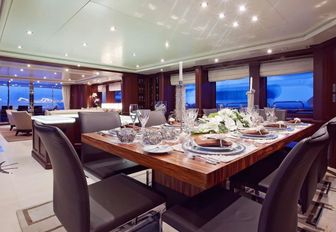 formal dining area in main salon of luxury yacht ‘Pure Bliss’ 