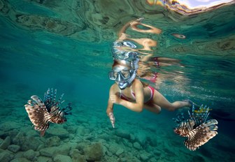 girl goes snorkelling in the South Pacific 