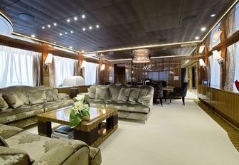 main salon with lounge aft and dining option forward on board superyacht OKKO 