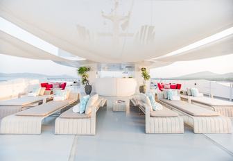 chic outdoor seating areas on the deck of luxury yacht SALUZI