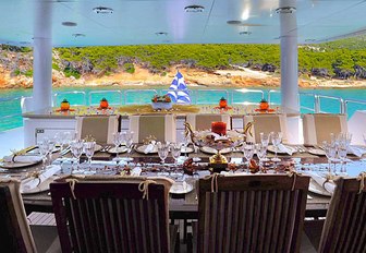 table set for an alfresco dinner on the aft deck of luxury yacht ‘Ionian Princess’ 