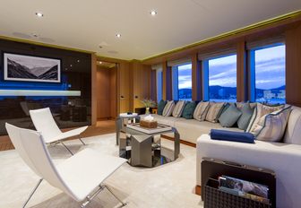 laid-back skylounge with long, deep sofa on board luxury yacht GO