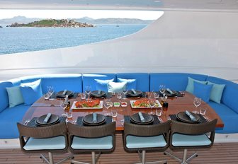 alfresco dining area on sundeck of luxury yacht INCEPTION 