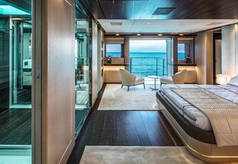 stylish master suite with drop-down balcony on board motor yacht NAMASTE