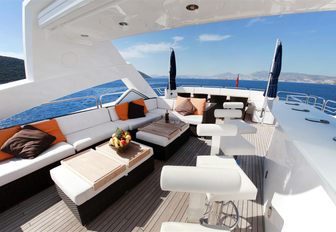 lounging area and bar on the sundeck of luxury yacht Barracuda Red Sea