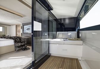 The sliding glass door which separates the master cabin and its balcony on board Heesen superyacht IRISHA