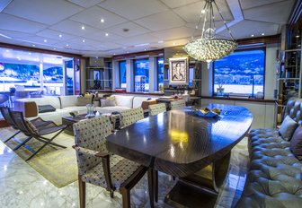 formal dining area in the main salon of charter yacht ZULU