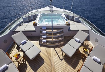 jacuzzi and sunpads lined up on the sundeck of charter yacht ‘Zoom Zoom Zoom’ 