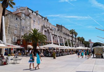 Visitors strolling through the ancient town of Split in Croatia