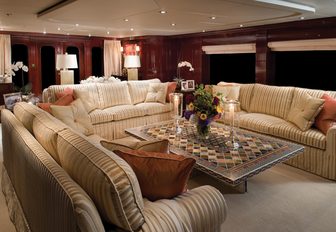 Sofas in main salon lounge area on board luxury yacht Lady Joy