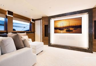seating and large TV in man salon of luxury yacht ‘Silver Wind’ 