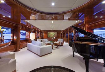 grand piano in main salon of motor yacht Aspen Alternative