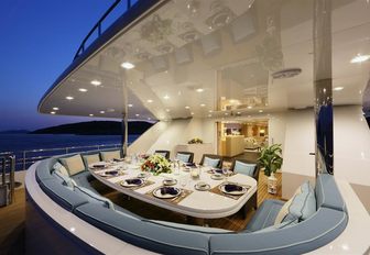 sophisticated alfresco dining area on main deck aft
