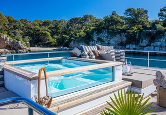 Glass-rimmed pool on deck of superyacht Mimi La Sardine
