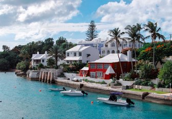 colourful houses line the shore in Bermuda