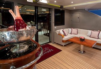 bar and sofa in the cockpit of luxury yacht BLUSH 
