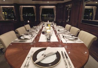 The formal dining area featured on board motor yacht ENCHANTRESS