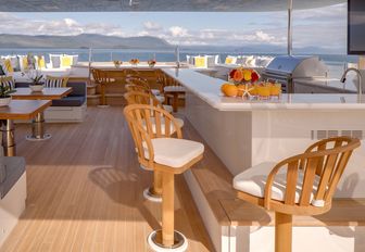 bar and seating area on the sundeck of luxury yacht Endless Summer