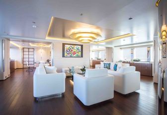 cool and contemporary main salon lounge on board charter yacht AQUIJO 