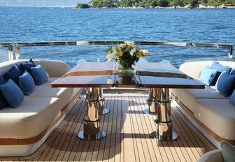 convertible seating area on the aft deck of luxury yacht SOLIS 