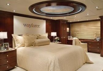 King size bed in master suite of charter yacht Lady Joy