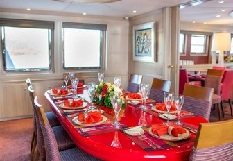 formal dining area in main salon aboard motor yacht ‘Cheetah Moon’ 